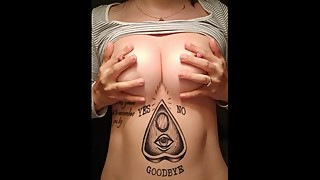 Wife plays with perky natural tits and pierced nipples