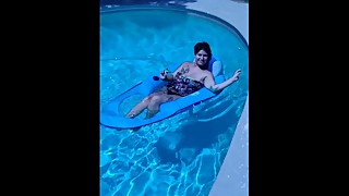 Wife caught by husband vaping weed in pool.